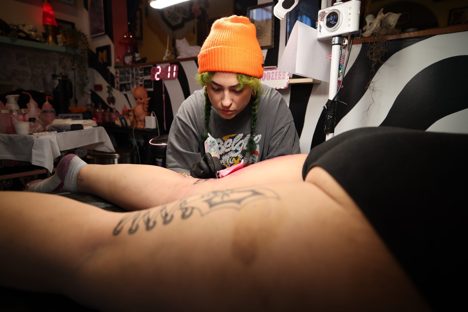 Authentic Essentials — tattoo artist at work